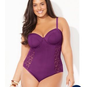 One piece, underwire lightly lined swim suite with lace side